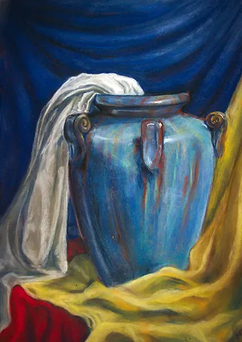 Still life painting of a blue glazed vase with white and yellow drapery against deep blue cloth